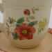 This shows the details of the backside of the flowers and saucer. This shows the details of the backside of the flowers and saucer.